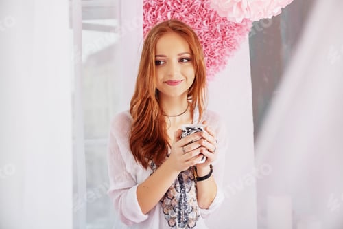 Preview: Dreamy girl drinking coffee. The concept of home and lifestyle