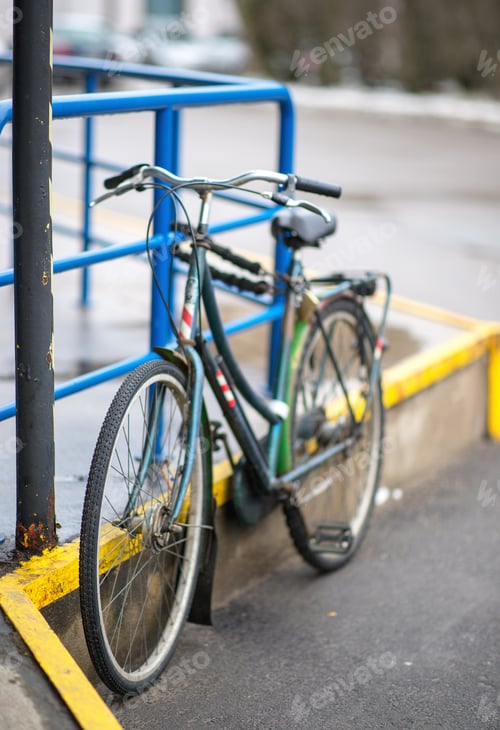 Preview: wet bicycle in the rain