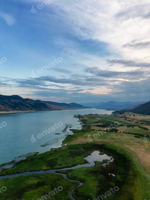 Preview: Aerial View of Okanagan Lake with farm lands and mountain landscape