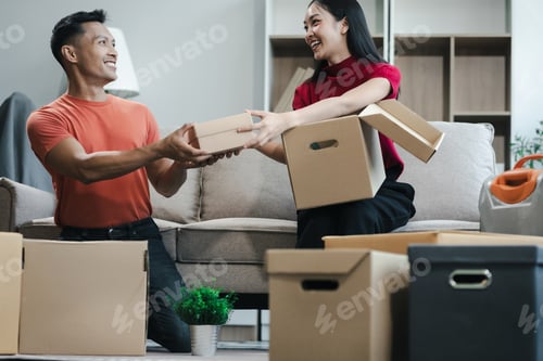 Preview: young couple helps put things in boxes and prepares to move to a new house.