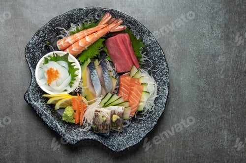 Preview: mixed sashimi plate in japanese restaurant on grey background