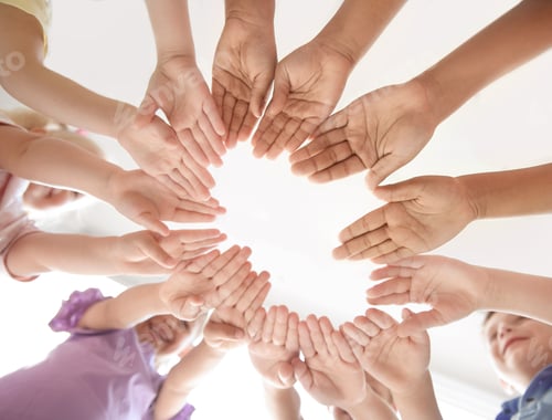 Vista previa: Little children putting their hands together indoors, view from below. Unity concept