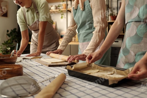 Preview: Three Caucasian Women Baking Pastries Together in Kitchen Preparing Dough