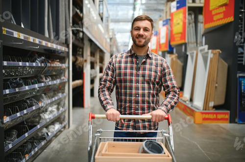 Preview: Portrait of happy mature man standing in hardware store