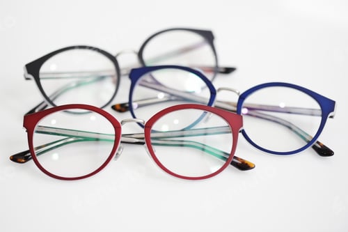 Preview: Multicolored glasses on the white background