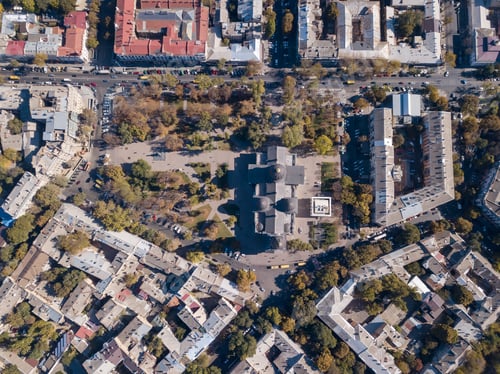 Preview: Top view of the road with cars, rooftops and the Spaso-Preobrazhensky Cathedral on a sunny day