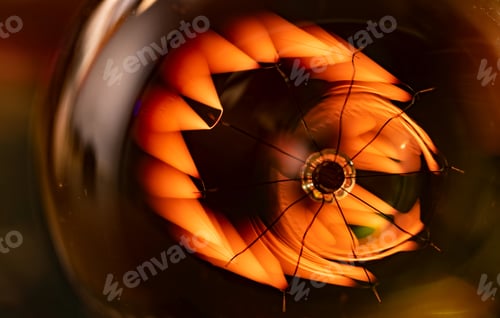 Preview: An incandescent lamp illuminates a dark room with orange light