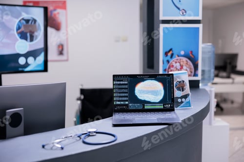 Preview: Laptop monitoring health status of sick person cerebrum