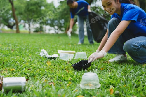 Preview: Volunteers collecting trash in the park, protecting the environment