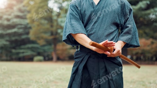 Preview: Park, bamboo sword and hands of Asian man in nature for martial arts, Kendo practice and exercise.