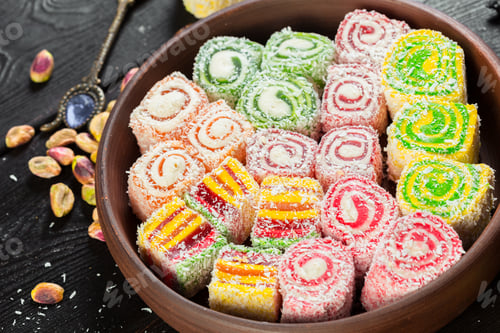 Preview: Turkish delight on a wooden table.