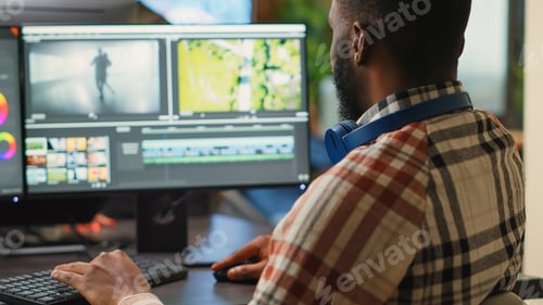 Preview: Young graphic designer artist editing video content on software