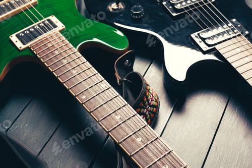 Preview: Electric guitar body and neck detail on wooden background