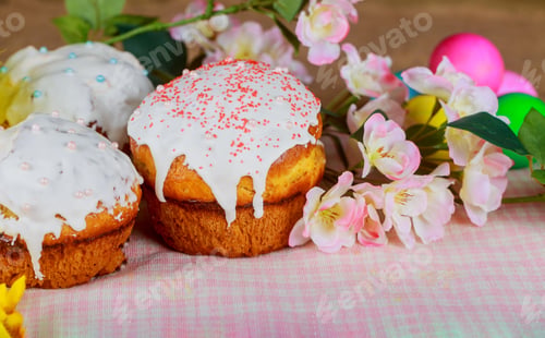 Preview: Easter cake and colorful eggs on kitchen table