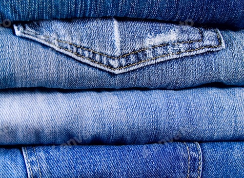 Preview: Neatly Folded Denim Jeans and Denim Pocket Detail