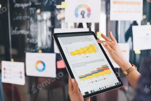 Preview: cropped entrepreneur with digital tablet reading business information