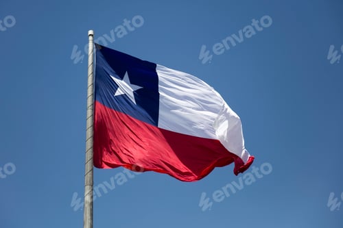 Preview: Chilean flag under blue sky