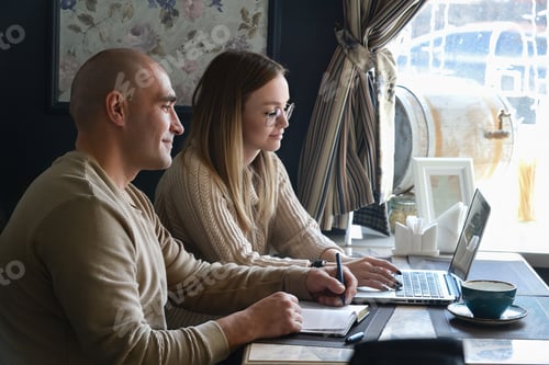 Preview: meeting of business partners at work in a cafe