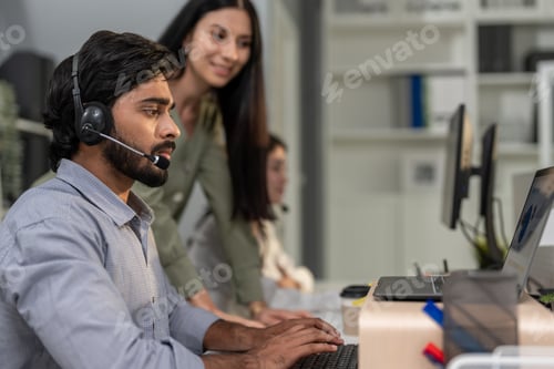 Preview: Asian professional businessman using laptop computer video call in office.