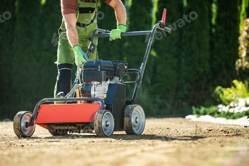 Preview: Landscaper Pushing Lawn Aerator