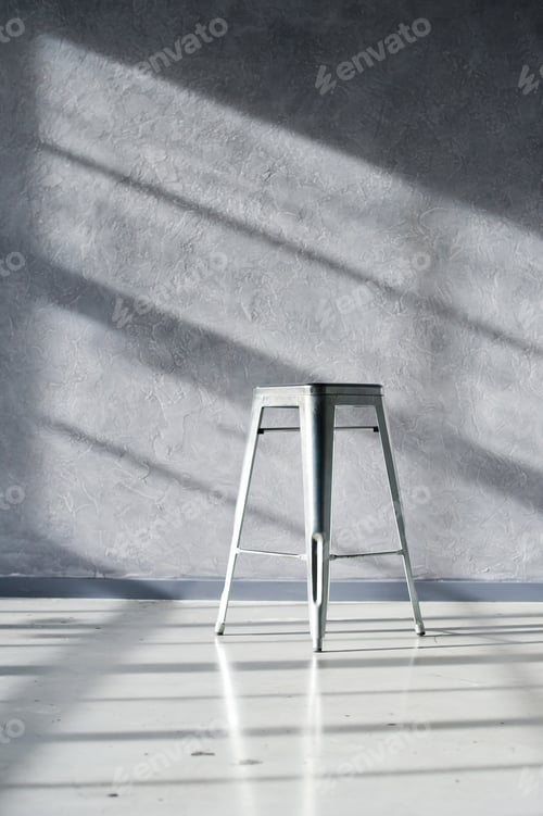 Preview: Steel chair in the interior of a black loft Studio. 10.11.2019 USA, New York