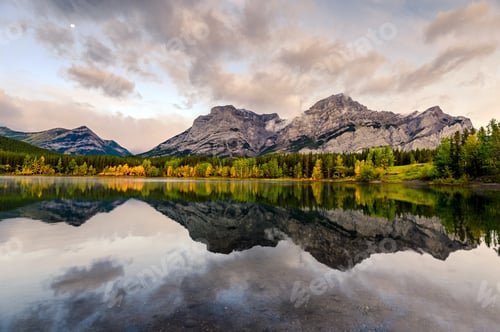Preview: Canadian rockies with the moon reflection on Wedge pond in the morning at Kananaskis country