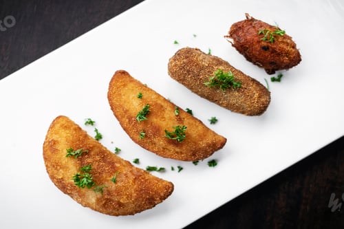 Preview: portuguese traditional mixed fried tapas snacks on plate