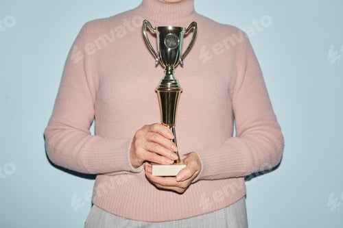 Preview: Mature Woman Holding Trophy Flash Shot