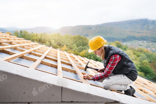 Preview: Young woman worker on the construction site.