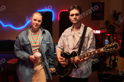 Preview: Blogger and Musician Posing in Podcast Room