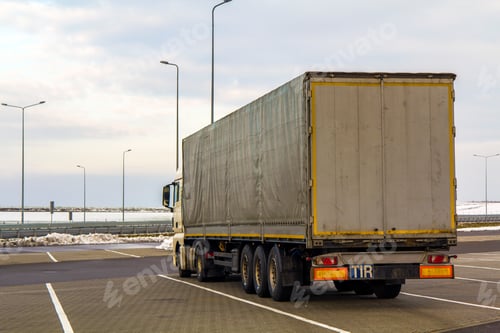 Preview: Big cargo truck parked on a parking lot
