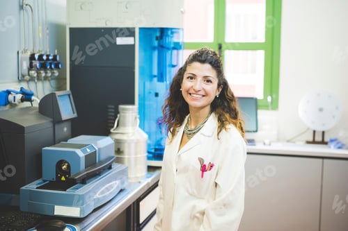 Preview: Female scientist and Thermogravimetric/Differential Thermal Analyzer