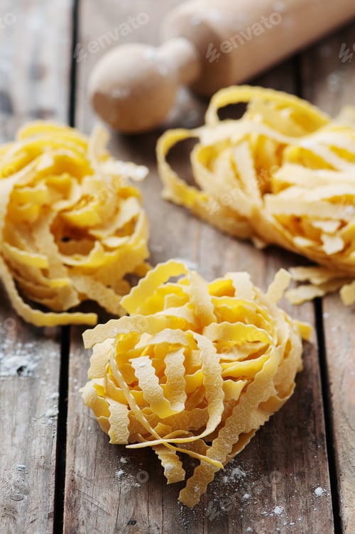 Preview: Uncooked italian pasta on the table