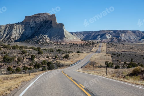Preview: Scenic road in the desert during a vibrant sunny day