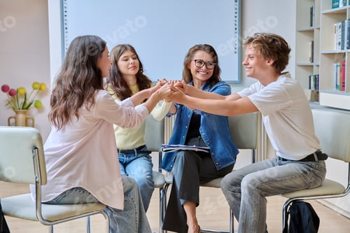 Preview: Group teamwork, students teenagers sitting in circle with female teacher, counselor