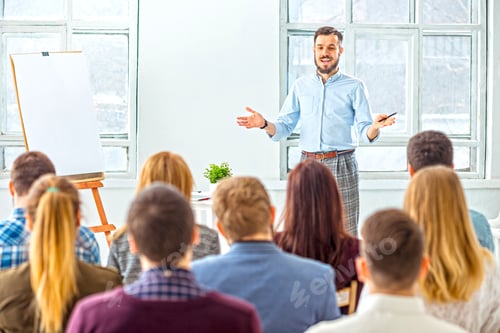 Speaker at Business Meeting in the conference hall.
