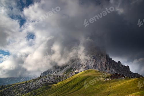 Preview: View of Ra Gusela mountain with green meadows and blue sky, Dolomites, Italy