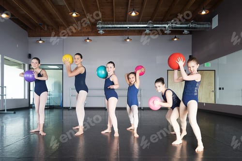 Preview: Group of kids playing dodge ball in dance studio having fun