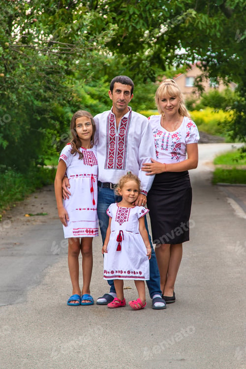 Preview: Family Ukrainians in vyshyvanka patriots. Selective focus.