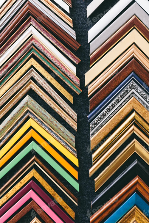 Preview: Wooden picture frames on wall in a store, background