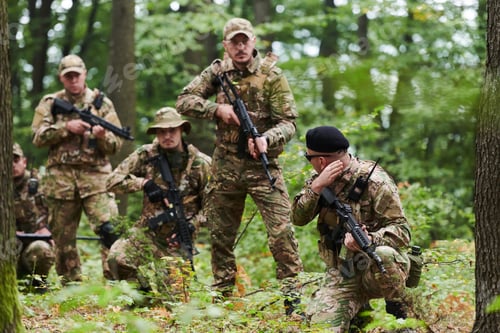 Preview: A disciplined and specialized military unit, donned in camouflage, strategically patrolling and