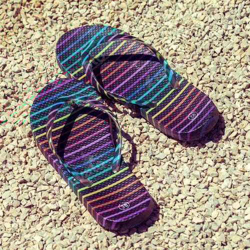 Preview: Flip-flops on stony beach