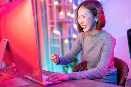 Preview: At home game player wearing headset have fun play battle streaming online game