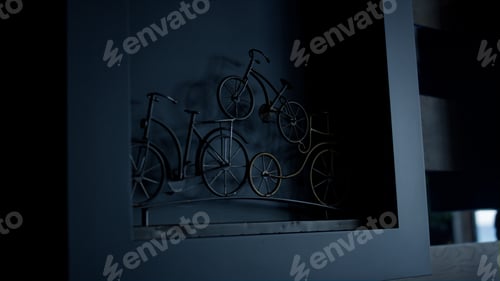 Preview: Bicycle metal sculpture loft apartments closeup. Decorated statuette concept