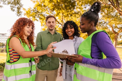 Preview: Volunteers discussing activism with people in a public park