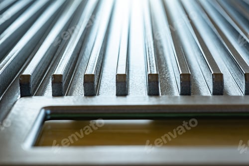 Preview: Fluted metal surface next to a control panel
