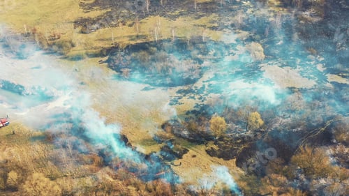 Preview: Aerial View. Spring Dry Grass Burns During Drought Hot Weather. Bush Fire And Smoke. Fire Engine