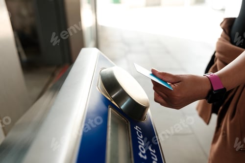 Preview: Woman using credit card to pay public transport fare