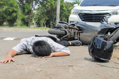 Preview: Motorcycle Accident Scene With Man Injured and Lying on Road