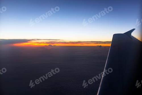 Preview: Sunset or sunrise from airplane